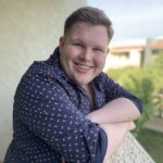 Headshot of EC Darling-Bond